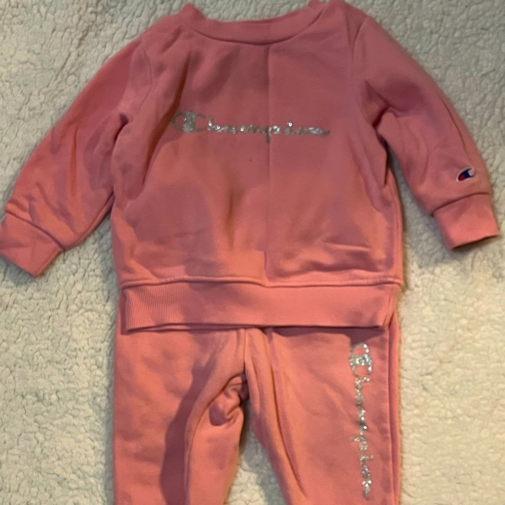 Used Champion girls track suite size 12 months light pink color